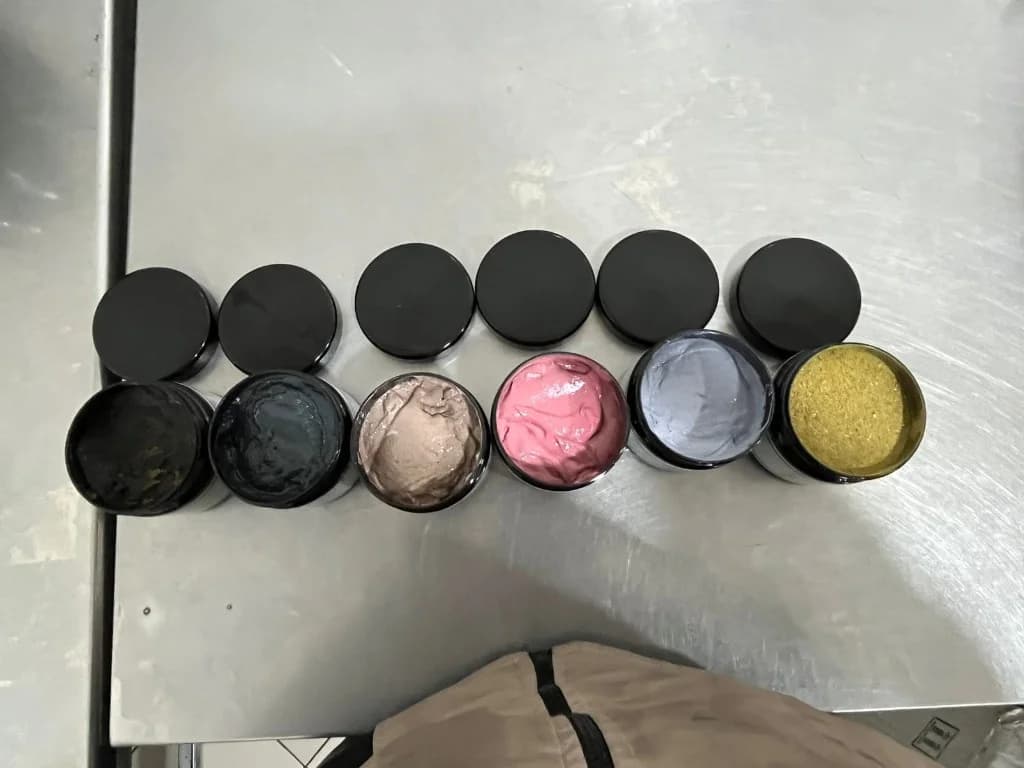 Moroccan hammam formulations: black soap, ghassoul and colored masks in jars