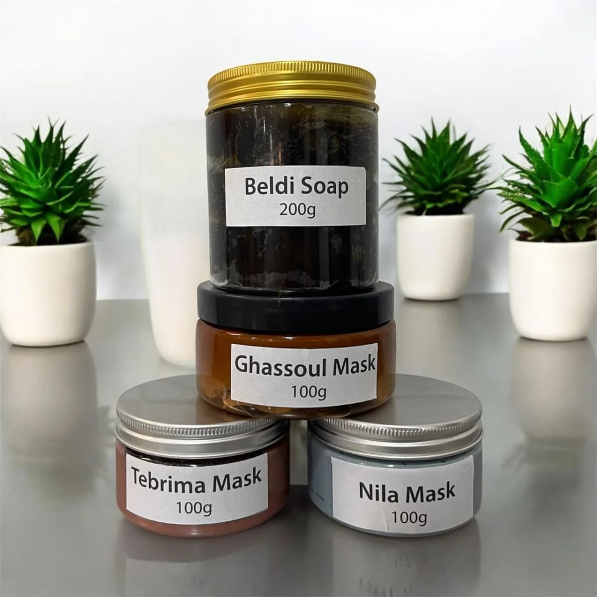 Moroccan harvest organic skincare line with kessa glove, oils and floral waters